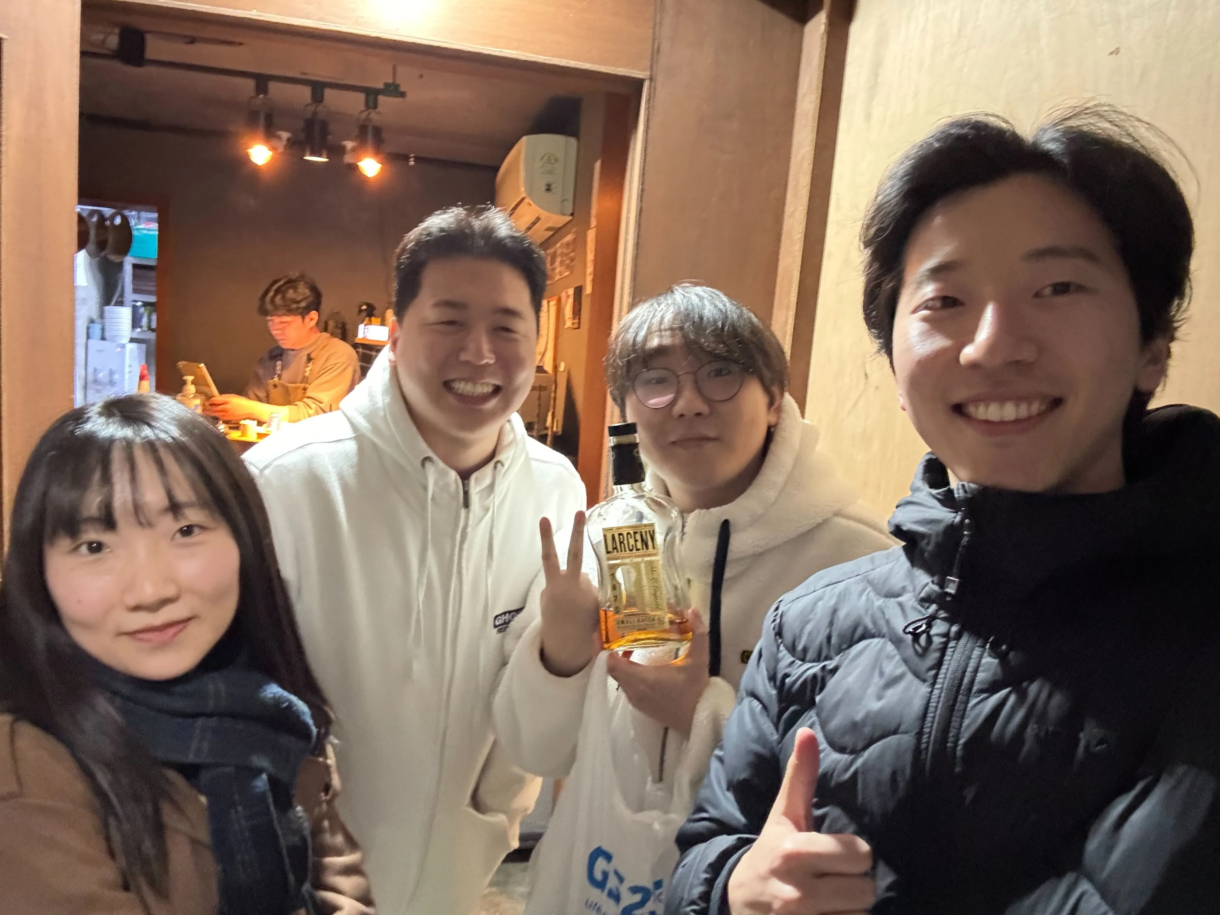 SERA Lab members taking a group selfie during an evening out